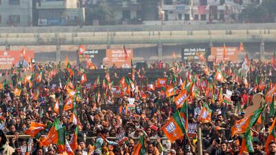 Bharatiya Janata Party (BJP) supporters attend PM Modi's public rally ahead of the Delhi Assembly Elections, at Kartar Nagar, Yamuna Khadar in New Delhi on Wednesday. (ANI) Bharatiya Janata Party (BJP) supporters attend PM Modi's public rally ahead of the Delhi Assembly Elections, at Kartar Nagar, Yamuna Khadar in New Delhi on Wednesday. (ANI)