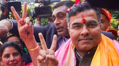 BJP candidate from New Delhi assembly constituency Parvesh Verma shows victory sign upon reaching his residence, amid the counting of votes for the Delhi assembly elections in New Delhi on Saturday, (PTI) BJP candidate from New Delhi assembly constituency Parvesh Verma shows victory sign upon reaching his residence, amid the counting of votes for the Delhi assembly elections in New Delhi on Saturday, (PTI)