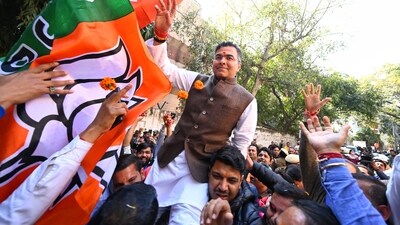 Delhi election result: BJP's Parvesh Verma celebrates his victory from the New Delhi assembly constituency on Saturday. (Sanchit Khanna) Delhi election result: BJP's Parvesh Verma celebrates his victory from the New Delhi assembly constituency on Saturday. (Sanchit Khanna)