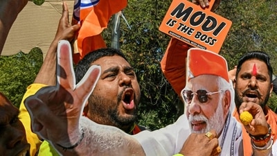 Supporters of the BJP celebrate as BJP leads in vote counting for the Delhi legislative assembly election outside the party's state headquarters in New Delhi on February 8, 2025. (AFP) Supporters of the BJP celebrate as BJP leads in vote counting for the Delhi legislative assembly election outside the party's state headquarters in New Delhi on February 8, 2025. (AFP)