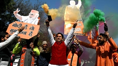 Delhi election result highlights: Bharatiya Janata Party supporters celebrate as they lead in the Delhi legislative assembly polls at the BJP headquarters in New Delhi on February 8, 2025. (AFP) Delhi election result highlights: Bharatiya Janata Party supporters celebrate as they lead in the Delhi legislative assembly polls at the BJP headquarters in New Delhi on February 8, 2025. (AFP)