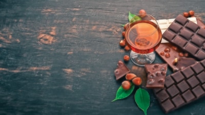 Wine and chocolate are a perfect duo that sets the mood for a romantic evening. Wine and chocolate are a perfect duo that sets the mood for a romantic evening.