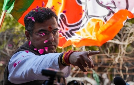BJP candidate from New Delhi assembly constituency Parvesh Verma celebrates outside a counting centre after claiming victory in the Delhi Assembly polls amid the counting of votes, in New Delhi, Saturday, (PTI) BJP candidate from New Delhi assembly constituency Parvesh Verma celebrates outside a counting centre after claiming victory in the Delhi Assembly polls amid the counting of votes, in New Delhi, Saturday, (PTI)