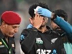 New Zealand's Rachin Ravindra (C) receives medical attention after being hit on the head by the ball during the Tri-Nation's first one-day international cricket match between Pakistan and New Zealand at the Gaddafi Stadium in Lahore on February 8 New Zealand's Rachin Ravindra (C) receives medical attention after being hit on the head by the ball during the Tri-Nation's first one-day international cricket match between Pakistan and New Zealand at the Gaddafi Stadium in Lahore on February 8
