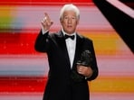 Richard Gere holds the International Goya Award during the Spanish Film Academy's Goya Awards ceremony in Granada, Spain February 8, 2025. REUTERS/Jon Nazca