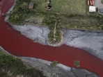 Residents suspect nearby leather and textile factories of discharging dyes.