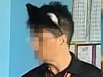 The teacher wears a cat ear headband to class. The teacher wears a cat ear headband to class.