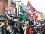 Performers hold Philadelphia Eagles and Kansas City Chiefs flags during the Super Bowl Host Committee Parade on February 08, 2025 in New Orleans, Louisiana. Performers hold Philadelphia Eagles and Kansas City Chiefs flags during the Super Bowl Host Committee Parade on February 08, 2025 in New Orleans, Louisiana.