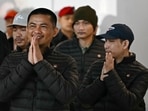 Freed Thai nationals return to Thailand at Bangkok's Suvarnabhumi Airport on Sunday.