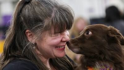 Alicia Bismore with her dog Dazy, waits for the flyball tournament at the 149th Westminster Kennel Club Dog show in New York. (AP Photo/Heather Khalifa) Alicia Bismore with her dog Dazy, waits for the flyball tournament at the 149th Westminster Kennel Club Dog show in New York. (AP Photo/Heather Khalifa)