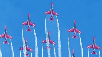 Air Force's Surya Kiran Aerobatic team performs during the final rehearsal ahead of ‘Aero India 2025’ at Air Force station in Bengaluru on Thursday. (Savitha/ ANI) Air Force's Surya Kiran Aerobatic team performs during the final rehearsal ahead of ‘Aero India 2025’ at Air Force station in Bengaluru on Thursday. (Savitha/ ANI)