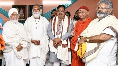 Rajasthan Chief Minister Bhajanlal Sharma poses for a group picture with spiritual leaders during his visit to the ongoing Mahakumbh, in Prayagraj on Sunday. ((ANI Photo)) Rajasthan Chief Minister Bhajanlal Sharma poses for a group picture with spiritual leaders during his visit to the ongoing Mahakumbh, in Prayagraj on Sunday. ((ANI Photo))