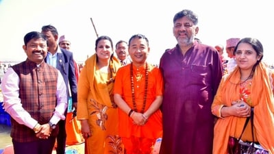 Karnataka Deputy CM DK Shivakumar with family and Sikkim chief minister Tamang at the Mahakumbh Mela, in Uttar Pradesh's Prayagraj. (PTI) Karnataka Deputy CM DK Shivakumar with family and Sikkim chief minister Tamang at the Mahakumbh Mela, in Uttar Pradesh's Prayagraj. (PTI)
