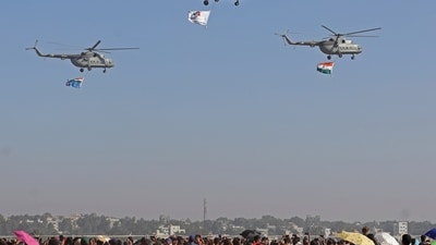 People gather to watch a rehearsal of IAF aircraft ahead of Aero India 2025, at Yelahanka Air Force Station in Bengaluru. (PTI) People gather to watch a rehearsal of IAF aircraft ahead of Aero India 2025, at Yelahanka Air Force Station in Bengaluru. (PTI)