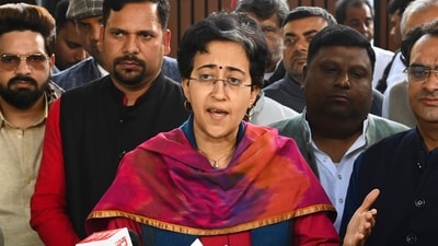 Former Delhi chief minister Atishi, with AAP winning candidates, addresses the media after a meeting with party convenor Arvind Kejriwal, outside his residence in New Delhi, Sunday. (PTI) Former Delhi chief minister Atishi, with AAP winning candidates, addresses the media after a meeting with party convenor Arvind Kejriwal, outside his residence in New Delhi, Sunday. (PTI)