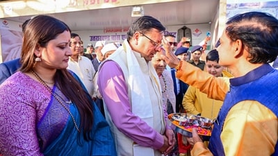 Uttarakhand Chief Minister Pushkar Singh Dhami with her wife Geeta Dhami visits Uttarakhand Mandapam during the ongoing 'Maha Kumbh', in Prayagraj on Sunday. (ANI) Uttarakhand Chief Minister Pushkar Singh Dhami with her wife Geeta Dhami visits Uttarakhand Mandapam during the ongoing 'Maha Kumbh', in Prayagraj on Sunday. (ANI)