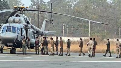Security forces bring the bodies of Maoists and recovered arms and ammunition to district headquarters in Bijapur on Sunday. (ANI) Security forces bring the bodies of Maoists and recovered arms and ammunition to district headquarters in Bijapur on Sunday. (ANI)