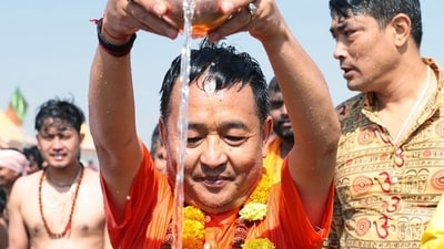 Mahakumbh Mela: Sikkim Chief Minister Prem Singh Tamang offers arghya at Triveni Sangam during the ongoing 'MahaKumbh', in Prayagraj on Sunday. (ANI) Mahakumbh Mela: Sikkim Chief Minister Prem Singh Tamang offers arghya at Triveni Sangam during the ongoing 'MahaKumbh', in Prayagraj on Sunday. (ANI)