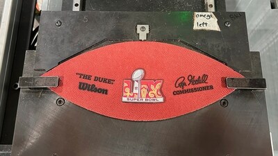 Super Bowl's official logo of the year is seen printed in the ball. It was designed by a local artist Tahj "Queen Tahj" Williams, incorporating bright red, green and yellow colours. It also has the theme on the streets surrounding the Caesars Superdome, the site of this year's game. (AP) Super Bowl's official logo of the year is seen printed in the ball. It was designed by a local artist Tahj "Queen Tahj" Williams, incorporating bright red, green and yellow colours. It also has the theme on the streets surrounding the Caesars Superdome, the site of this year's game. (AP)