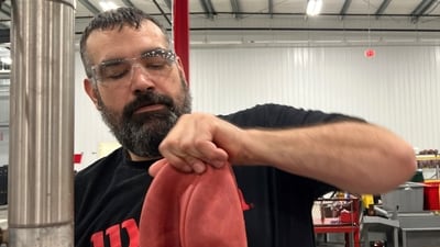 Over 20 steps in the ball production process are performed by skilled personnel. (AP) Over 20 steps in the ball production process are performed by skilled personnel. (AP)