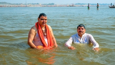 Rajasthan Chief Minister Bhajanlal Sharma with Madhya Pradesh CM Mohan Yadav takes a holy dip during the ongoing Maha Kumbh Mela, in Prayagraj, Saturday. (PTI) Rajasthan Chief Minister Bhajanlal Sharma with Madhya Pradesh CM Mohan Yadav takes a holy dip during the ongoing Maha Kumbh Mela, in Prayagraj, Saturday. (PTI)