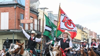 Performers hold Philadelphia Eagles and Kansas City Chiefs flags during the Super Bowl Host Committee Parade on February 08, 2025 in New Orleans, Louisiana. (Getty Images via AFP) Performers hold Philadelphia Eagles and Kansas City Chiefs flags during the Super Bowl Host Committee Parade on February 08, 2025 in New Orleans, Louisiana. (Getty Images via AFP)