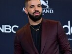 Drake surprises fans at Melbourne concert with $45,000 giveaway, showcasing his generosity despite Super Bowl challenges. (Photo by Richard Shotwell/Invision/AP, File)