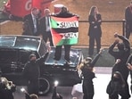 A protestor holds a Palestinian flag with the words "Gaza" and "Sudan" as US rapper Kendrick Lamar performs during Super Bowl LIX Chiefs vs Eagles Apple Music Halftime Show at Caesars Superdome in New Orleans, Louisiana, February 9, 2025. (Photo by Chandan Khanna / AFP) A protestor holds a Palestinian flag with the words "Gaza" and "Sudan" as US rapper Kendrick Lamar performs during Super Bowl LIX Chiefs vs Eagles Apple Music Halftime Show at Caesars Superdome in New Orleans, Louisiana, February 9, 2025. (Photo by Chandan Khanna / AFP)