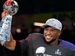 Philadelphia Eagles running back Saquon Barkley celebrates with the Vince Lombardi Trophy after the NFL Super Bowl 59 football game against the Kansas City Chiefs. Philadelphia Eagles running back Saquon Barkley celebrates with the Vince Lombardi Trophy after the NFL Super Bowl 59 football game against the Kansas City Chiefs.