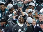 Head coach Nick Sirianni of the Philadelphia Eagles lifts the Vince Lombardi Trophy with the team. Head coach Nick Sirianni of the Philadelphia Eagles lifts the Vince Lombardi Trophy with the team.