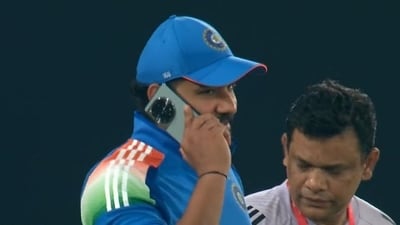 Rohit Sharma during a phone call. Rohit Sharma during a phone call.