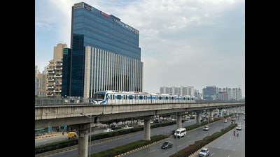 A Rapid Metro train runs from Sector 42/43 metro station towards Sikanderpur Metro Station on Golf Course Road. (HT PHOTO) A Rapid Metro train runs from Sector 42/43 metro station towards Sikanderpur Metro Station on Golf Course Road. (HT PHOTO)