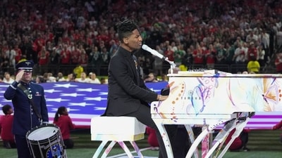 US singer-songwriter Jon Baptiste performs the National Anthem ahead of Super Bowl LIX between the Kansas City Chiefs and the Philadelphia Eagles at Caesars Superdome in New Orleans, Louisiana, February 9, 2025. (AFP) US singer-songwriter Jon Baptiste performs the National Anthem ahead of Super Bowl LIX between the Kansas City Chiefs and the Philadelphia Eagles at Caesars Superdome in New Orleans, Louisiana, February 9, 2025. (AFP)