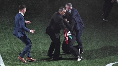 The set was also punctuated by a protestor who unfurled a flag in support of Gaza and Sudan during the performance, a moment production company Roc Nation told AFP was not rehearsed."The individual hid the item on his person and unveiled it late in the show," said the NFL, who added the protestor was part of the 400-member field cast. (AFP) The set was also punctuated by a protestor who unfurled a flag in support of Gaza and Sudan during the performance, a moment production company Roc Nation told AFP was not rehearsed."The individual hid the item on his person and unveiled it late in the show," said the NFL, who added the protestor was part of the 400-member field cast. (AFP)