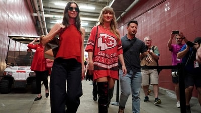 Taylor Swift wears a Chiefs T-shirt dress as she arrives before the start of an NFL football game between the Kansas City Chiefs and the Cincinnati Bengals Sunday, Sept. 15, 2024, in Kansas City, Mo. (AP)