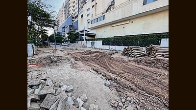 CP 67 Mall has now started repairing the dug up road. (HT Photo) CP 67 Mall has now started repairing the dug up road. (HT Photo)
