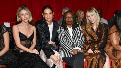 Julianne Hough, from left, Katie Holmes, Whoopi Goldberg and Natasha Bedingfield attend the Christian Siriano Fall/Winter 2025 fashion show at Chelsea Industrial during New York Fashion Week on Thursday, Feb. 6, 2025, in New York. (Photo by Evan Agostini/Invision/AP) (Evan Agostini/Invision/AP)