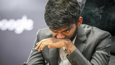Singapore: India's D Gukesh during the 13th game of the FIDE World Chess Championship 2024, in Singapore, Wednesday, Dec. 11, 2024. Indian Grandmaster D Gukesh tried his best but could not break past a resilient defending champion Ding Liren of China and had to settle for a draw after 68 moves in the 13th and penultimate game of the World Chess championship here on Wednesday. (FIDE/Eric Rosen via PTI Photo) (PTI12_11_2024_000423A) (PTI) Singapore: India's D Gukesh during the 13th game of the FIDE World Chess Championship 2024, in Singapore, Wednesday, Dec. 11, 2024. Indian Grandmaster D Gukesh tried his best but could not break past a resilient defending champion Ding Liren of China and had to settle for a draw after 68 moves in the 13th and penultimate game of the World Chess championship here on Wednesday. (FIDE/Eric Rosen via PTI Photo) (PTI12_11_2024_000423A) (PTI)