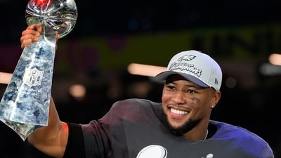 Philadelphia Eagles running back Saquon Barkley celebrates with the Vince Lombardi Trophy after the NFL Super Bowl 59 football game against the Kansas City Chiefs. (AP) Philadelphia Eagles running back Saquon Barkley celebrates with the Vince Lombardi Trophy after the NFL Super Bowl 59 football game against the Kansas City Chiefs. (AP)