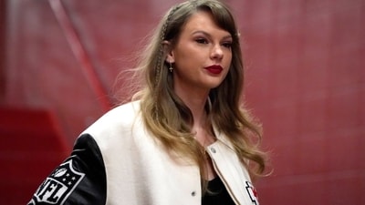 Taylor Swift wore a black and white Varsity jacket during her arrival at the Arrowhead Stadium for an NFL football game between the Kansas City Chiefs and the Cincinnati Bengals, Dec. 31, 2023, in Kansas City, Mo.&nbsp; (AP)