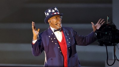 Samuel Jackson performs onstage. He dressed as Uncle Sam, a character emblematic of American patriotism that has frequently appeared in military propaganda. (Getty Images via AFP) Samuel Jackson performs onstage. He dressed as Uncle Sam, a character emblematic of American patriotism that has frequently appeared in military propaganda. (Getty Images via AFP)