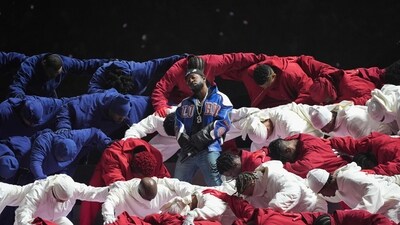 Lamar didn't make any direct references to Donald Trump -- who several weeks into his second go at the presidency attended the game -- but rather used the platform to offer a more symbolic critique of the marginalized treatment of both hip hop and Black Americans at large. (AFP) Lamar didn't make any direct references to Donald Trump -- who several weeks into his second go at the presidency attended the game -- but rather used the platform to offer a more symbolic critique of the marginalized treatment of both hip hop and Black Americans at large. (AFP)