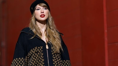 Taylor Swift rocked a Louis Vuitton jacket and matching beanie for Chiefs’ AFC Championship against the Buffalo Bills on January 26, 2025 (Getty Images)
