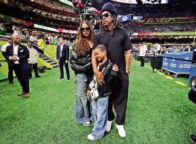 Rapper Jay-Z with children Blue Ivy and Rumi Carter