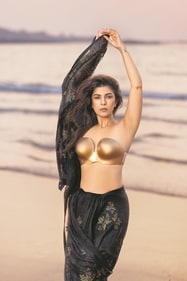 Nimrat Kaur dons a black Kota silk saree by Vidhi Singhania, adorned with foil print chinar leaf appliqué, styled with a structured gold breastplate from Suneet Varma | Outfit: Vidhi Singhania (Photo: Priyank Nandwana) Nimrat Kaur dons a black Kota silk saree by Vidhi Singhania, adorned with foil print chinar leaf appliqué, styled with a structured gold breastplate from Suneet Varma | Outfit: Vidhi Singhania (Photo: Priyank Nandwana)