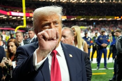 President Donald Trump gestures as he walks on the field before the start of the NFL Super Bowl 59 football game between the Philadelphia Eagles and the Kansas City Chiefs, Sunday, Feb. 9, 2025, in New Orleans. (AP Photo/Ben Curtis) (AP) President Donald Trump gestures as he walks on the field before the start of the NFL Super Bowl 59 football game between the Philadelphia Eagles and the Kansas City Chiefs, Sunday, Feb. 9, 2025, in New Orleans. (AP Photo/Ben Curtis) (AP)