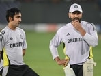 India's captain Rohit Sharma (R) speaks with head coach Gautam Gambhir during a practice session India's captain Rohit Sharma (R) speaks with head coach Gautam Gambhir during a practice session