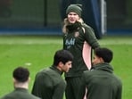 Manchester City's Norwegian striker #09 Erling Haaland (rear C) takes part in a training session at Manchester City's training ground in Manchester, north-west England, on February 10, 2025, on the eve of their UEFA Champions League football match against Real Madrid. (Photo by Paul ELLIS / AFP)