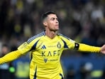 Al Nassr's Cristiano Ronaldo celebrates after scoring a goal.