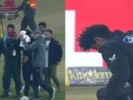 New Zealand's Rachin Ravindra (C) receives medical attention after being hit on the head by the ball during the Tri-Nation's first one-day international cricket match between Pakistan and New Zealand New Zealand's Rachin Ravindra (C) receives medical attention after being hit on the head by the ball during the Tri-Nation's first one-day international cricket match between Pakistan and New Zealand